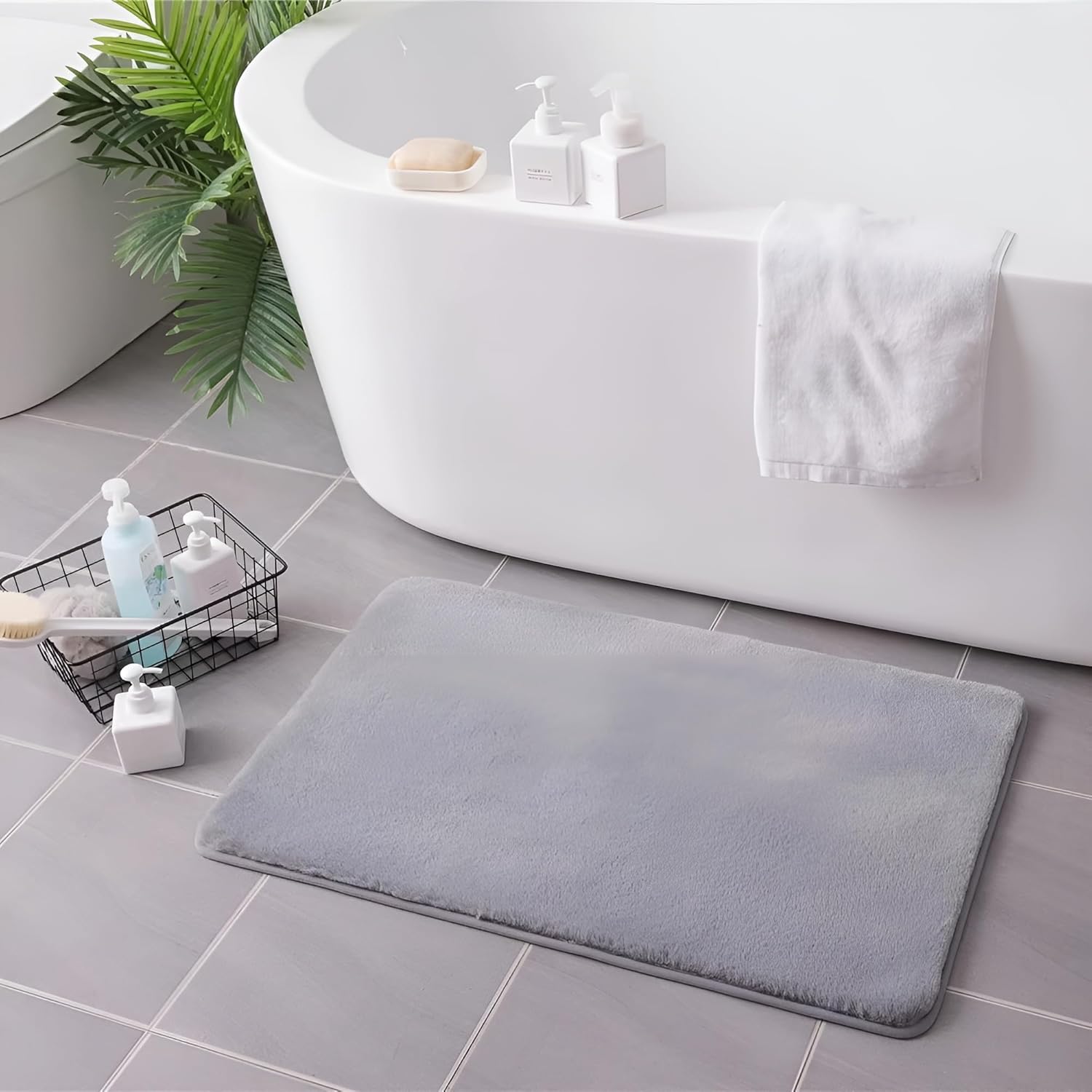 Grey soft faux rabbit fur rug placed in bathroom and home décor space by Prisha Cart