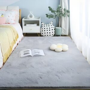 Alt Text: Grey soft faux rabbit fur carpet for bedroom and living room décor by Prisha Cart