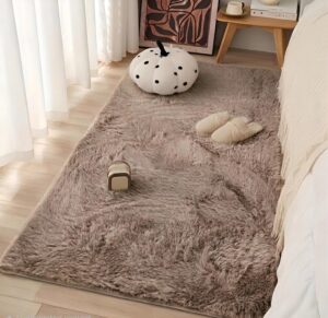 Soft faux rabbit fur carpet placed beside bed in cozy bedroom by Prisha Cart